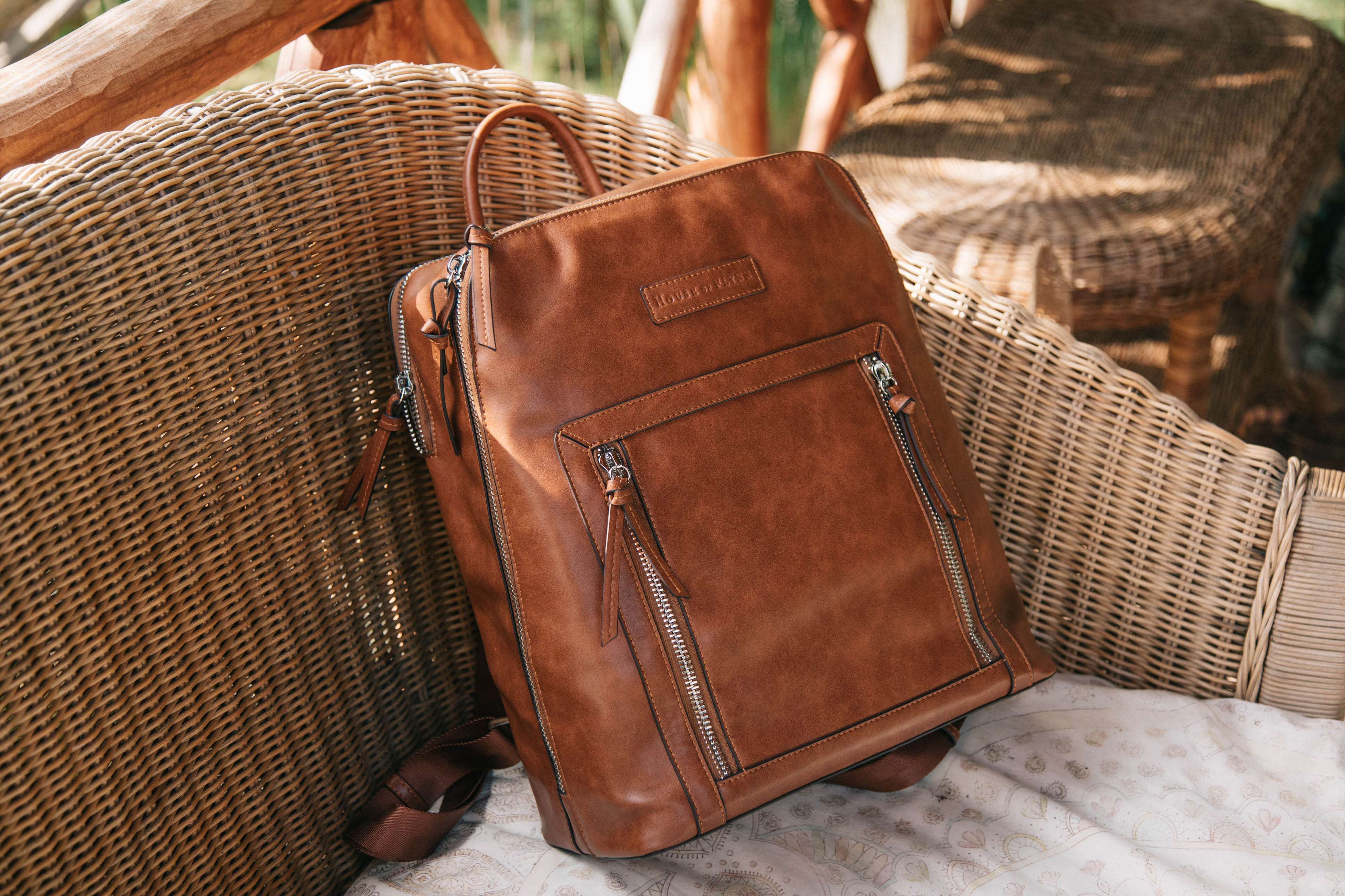 U.S. Marines Black Canvas Backpack Featuring An Embroidered USMC Emblem &  Brown Faux Leather Accents With A Free American Flag Pin